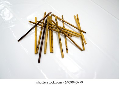 A Pile Of Sticks Used In The Filipino Martial Arts On A Dojo Floor 