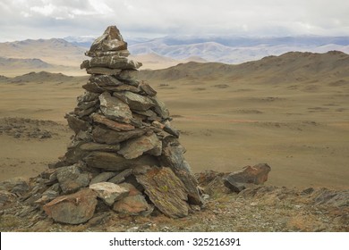 A pile of stones composed for shaman or pagan rituals in Mongolia