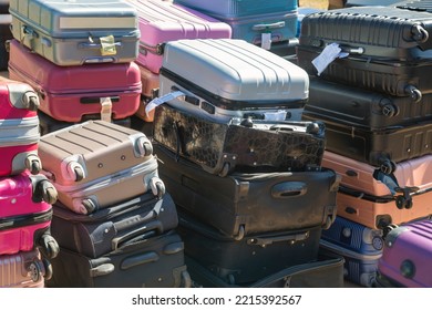 A Pile Of Suitcases At Lost And Found Department At The Airport