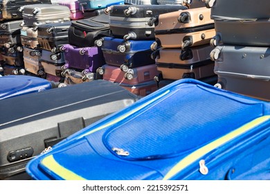 A Pile Of Suitcases At Lost And Found Department At The Airport