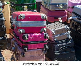 A Pile Of Suitcases At Lost And Found Department At The Airport