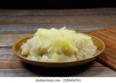 Pile Of Sweet Sticky Rice Dressing With Sweet Wild Yam Serving On The Plate. Famous Traditional Dessert In Asia Restaurant. 