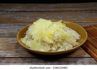 Pile Of Sweet Sticky Rice Dressing With Sweet Wild Yam Serving On The Plate. Famous Traditional Dessert In Asia Restaurant. 