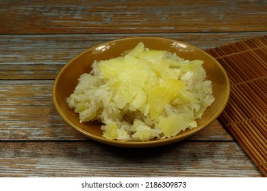 Pile Of Sweet Sticky Rice Dressing With Sweet Wild Yam Serving On The Plate. Famous Traditional Dessert In Asia Restaurant. 