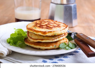 Pile Of Sweetcorn And Herb Pancakes On Plate