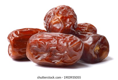 Pile of tasty dry dates isolated on white background. Arabic food - Shutterstock ID 1903935055