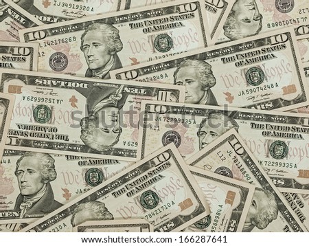 A Pile of Ten Dollar Bills as a Money Background