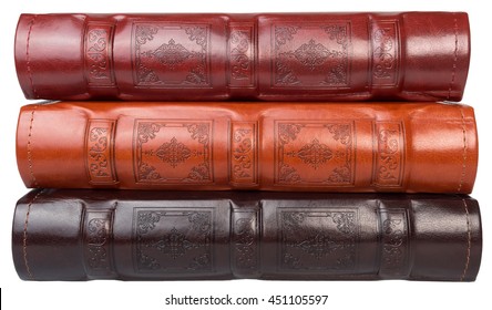 The Pile Of Three Leather Photo Books On White Isolated Backround