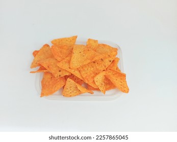 Pile of tortilla chips isolated

 - Shutterstock ID 2257865045