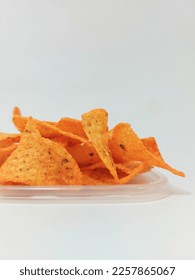 Pile of tortilla chips isolated

 - Shutterstock ID 2257865067