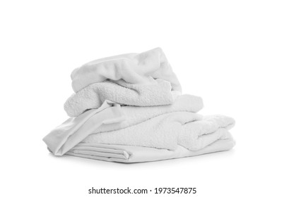 Pile Of Towels And Bedding On White Background