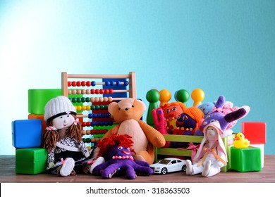 Pile Of Toys On Blue Background