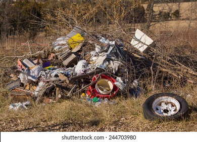 Pile Of Trash In A Field