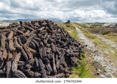 A Pile Of Turf Extracted From A Peat Bog In Rural Ireland