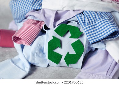 A Pile Of Used Clothes On The Floor. Recycling Of Clothes. Ecological And Sustainable Lifestyle. High Quality Photo