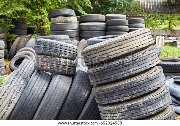 Pile of used tires, old\
tires storage