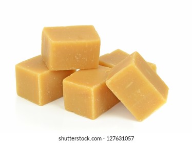 A Pile Of Vanilla Fudge On A White Background