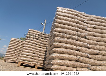 A pile of well-arranged sacks full of pellets