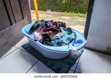 Pile Of Wet Cloth In A Bucket And Ready To Dry