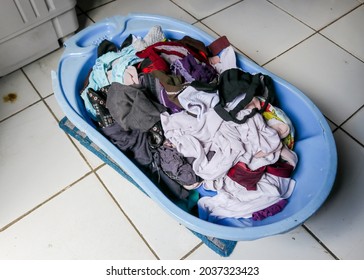 Pile Of Wet Cloth In A Bucket And Ready To Dry