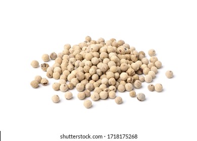 Pile of white peppercorns (white pepper) seeds isolated on white background.