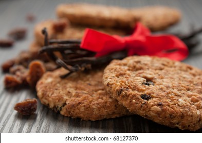 Pile of wholegrain cookies with raisins and nuts.