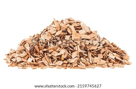 Pile of wood chips isolated on a white background. Wood chips for smoking or BBQ.