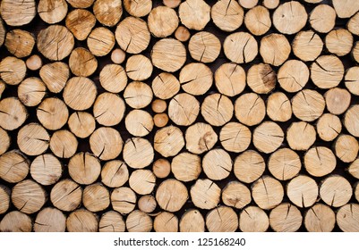 Pile of wood logs ready for winter