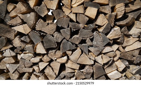 A Pile Of Wood Nearby House