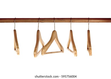 Pile Of Wooden Hangers Isolated On White Background