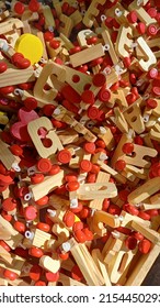 Pile Of Wooden Toy Train Letter-shaped. Overhead View