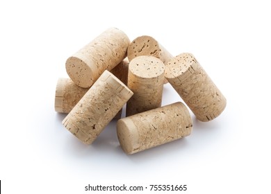 A Pile Of Wooden Wine Corks On A White Background