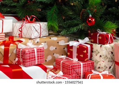 Pile Of Wrapped Presents Under The Christmas Tree