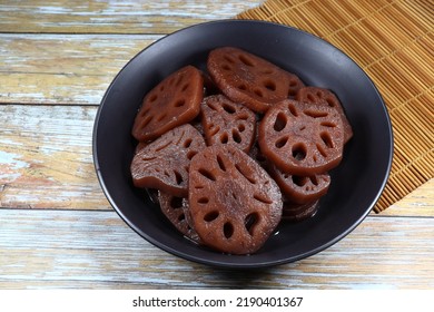 Piled Of Lotus Root In Syrup Serving In The Bowl. Famous Sweet Dessert In Chinese Restaurant. 