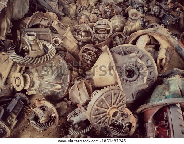 Piles of auto parts in the\
garage