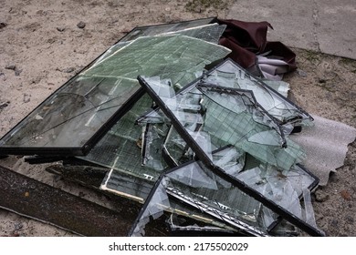 Piles of broken glass from windows from the apartment buildings were was knocked out by the blast wave as a result of by the Kalibr cruise missile airstrike at of the full-scale Ru invasion of Ukraine
