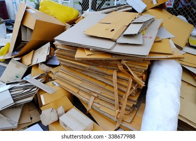 Piles Of Cardboard  Of Packaging Waste Paper Is Collected.