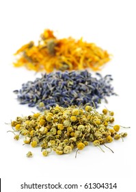 Piles Of Dried Medicinal Herbs Camomile, Lavender, Calendula On White Background