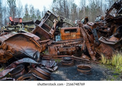 Piles of old rusty soviet crushed trucks in scrap metal yard. Car recycling