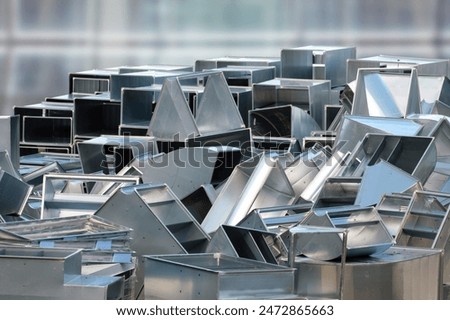 Piles of the ventilation ducts made of galvanized steel. 