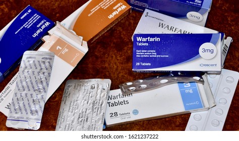 Piles of Warfin medicine in foiled packets and other medicine packets. Edinburgh Scotland UK. jaNUARY 2020
