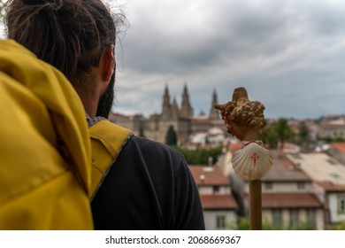 Pilgrim arriving from the Camino de Santiago de Compostela, Spain - view from the cathedral - selective focus
