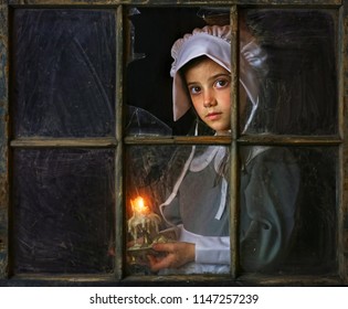 Pilgrim Girl With Candle By Window