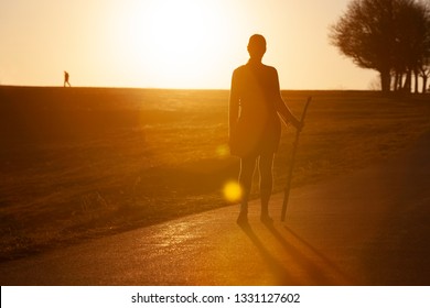 Pilgrim Woman At Sunset