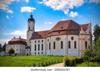 The Pilgrimage Church of Wies (German: Wieskirche) is an oval rococo church in the Bavarian Alps on a sunny day, Bavaria, Germany) - Shutterstock ID 2200332787