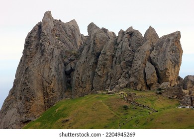 Pilgrims Climb The Sacred Mountain Beshbarmag. Baku. Azerbaijan. 