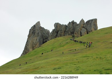 Pilgrims Climb The Sacred Mountain Beshbarmag. Baku. Azerbaijan. 