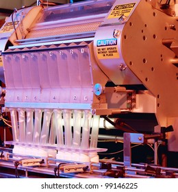 The Pill Counter In A Pharmaceutical Processing Facility.