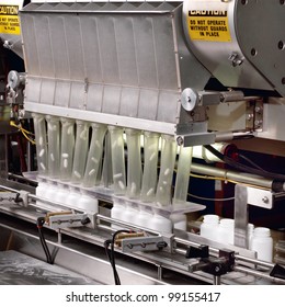 The Pill Counter In A Pharmaceutical Processing Facility.