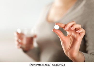 Pill In Hand.